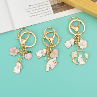 Alloy pink wreath cat oil drop flower rabbit keychain key pendant small gift diy accessories key chain