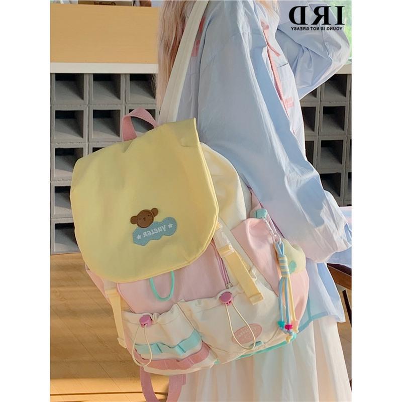 High-quality backpacks for elementary school students, middle school girls, and high-class girls; stylish and lightweight in a vibrant pink color scheme.