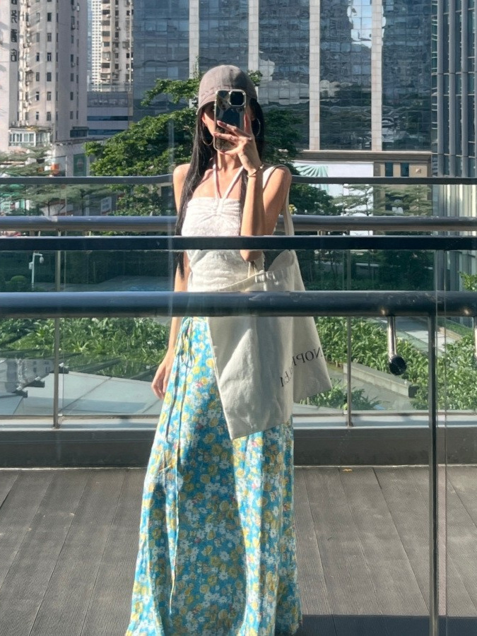 Beach Vacation Style Outfit with a Pure and Desirable Design: White Halter Neck Tube Top and Blue Floral Print Skirt Two-Piece Set