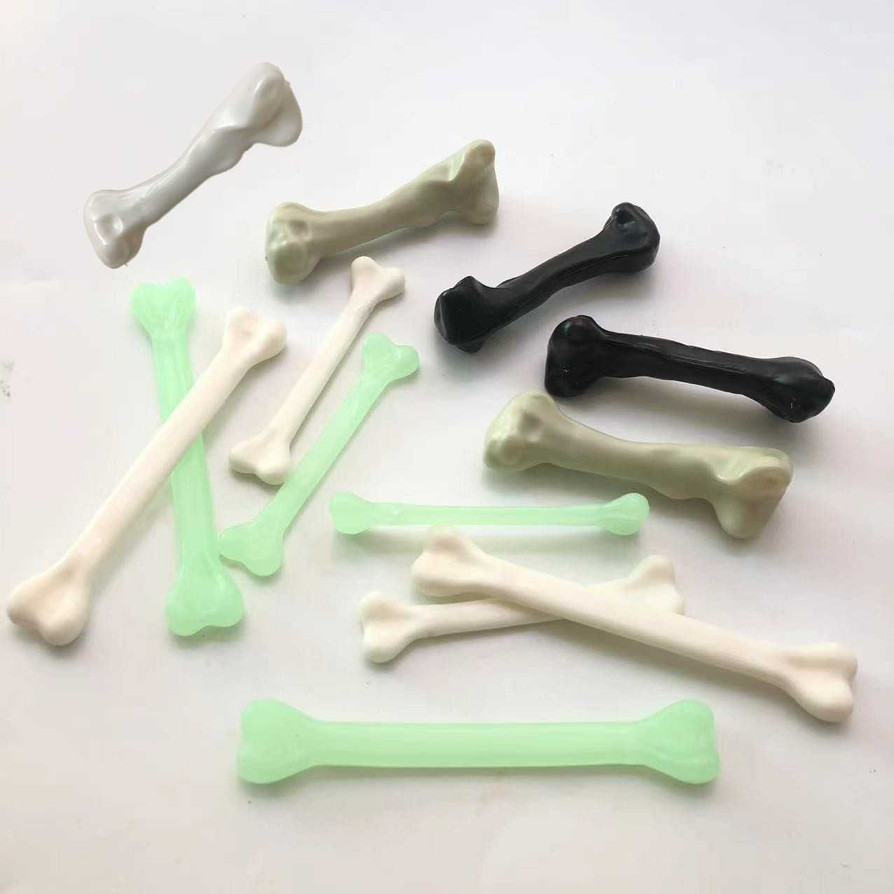Halloween decorative bone props, prank toys, necklace accessories, white/glow-in-the-dark plastic skull bones