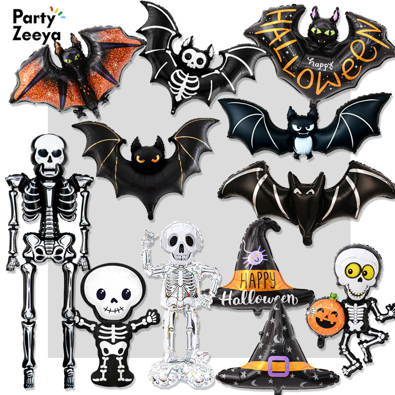 New Halloween-themed paper card packaging with aluminum foil balloon decorations: skull, bat, pumpkin, and skull.