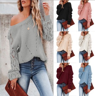 2022 Amazon cross-border solid color loose top women's autumn and winter foreign trade new hollow pattern round neck sweater women