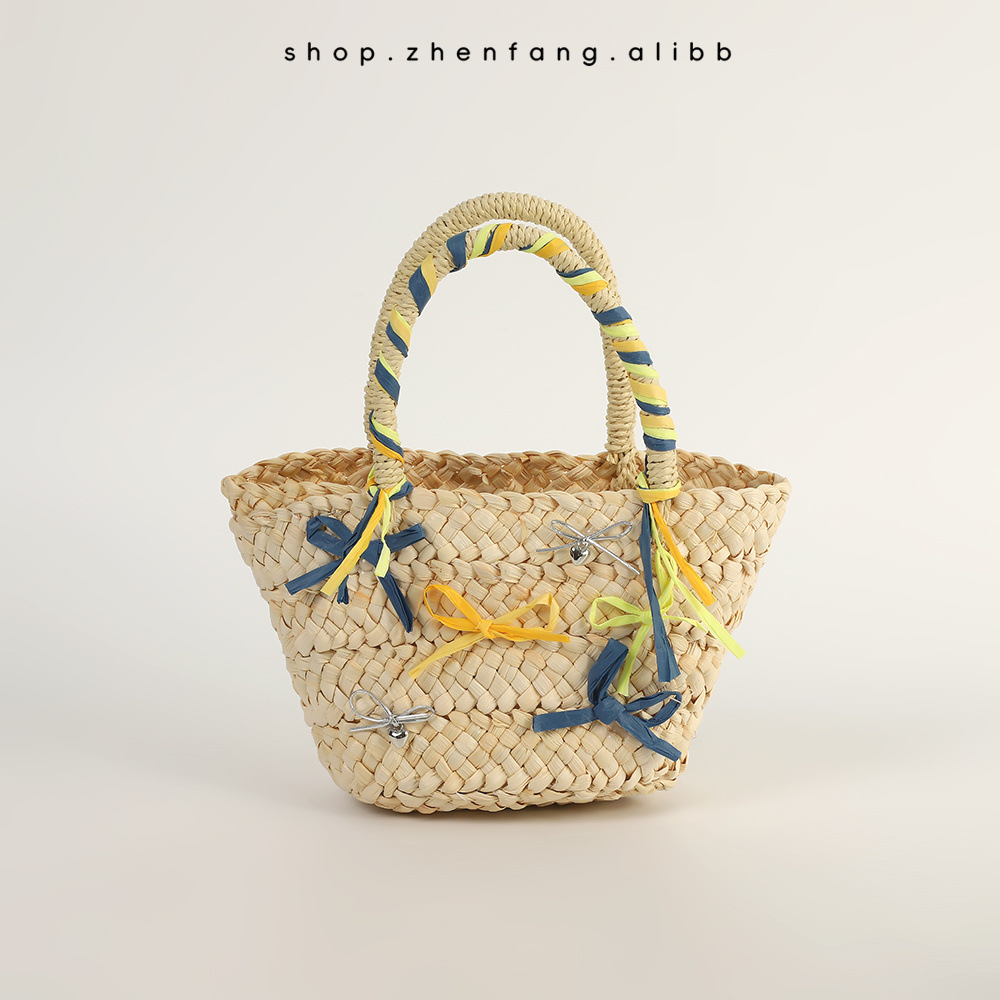 Pastoral style summer children's straw woven bags, high-value fashion butterfly flower beach vacation bags wholesale