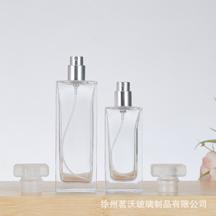 In stock wholesale flat square glass perfume bottle fashion transparent perfume sub-bottle 100ml essential oil spray bottle with lid