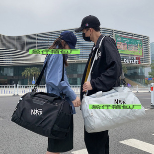 Cross-border wholesale large-capacity travel luggage multi-use portable shoulder travel bag men's and women's sports fitness bag