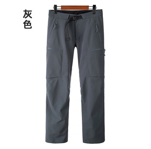 New outdoor assault pants men's winter waterproof windproof pressure glue fleece-lined warm outdoor soft shell mountaineering pants wholesale
