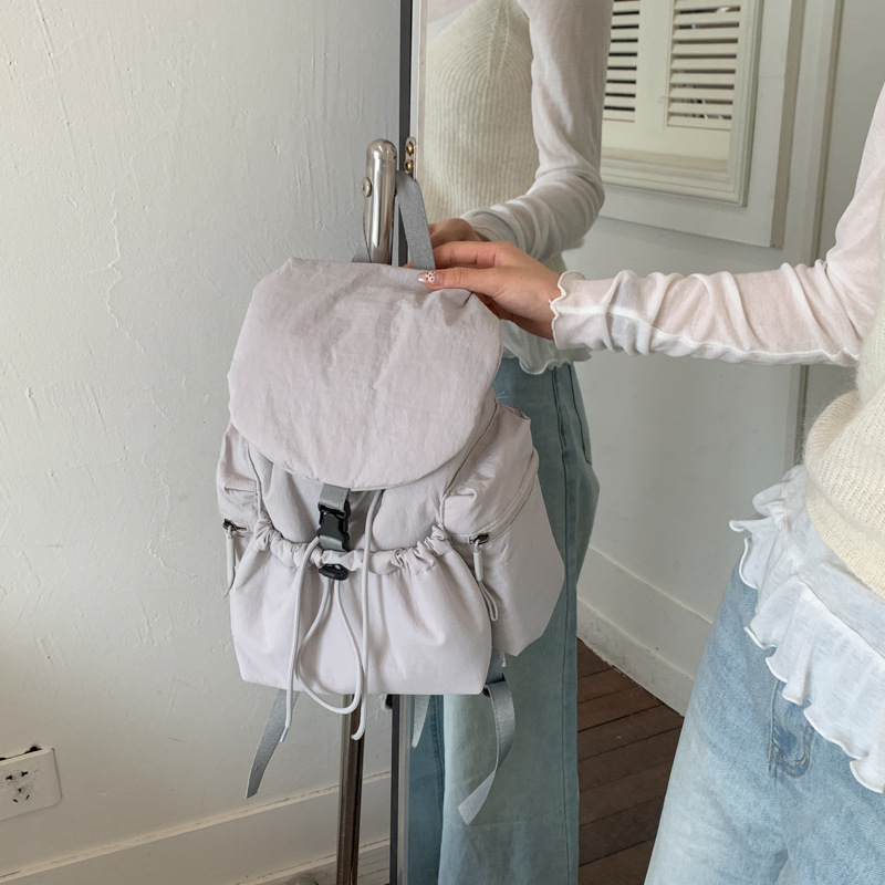 Hot-selling 2026 Korean style niche lightweight backpack for women, casual, fashionable, drawstring, versatile, travel, large capacity.