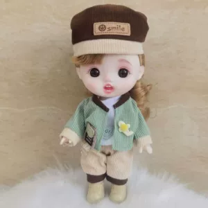 Виниловая кукла 22 см с большой головой и сменной одеждой