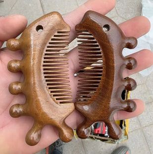 Golden sandalwood dolphin massage comb seahorse wooden comb manufacturers wholesale meridian comb in stock thickened wooden massage comb