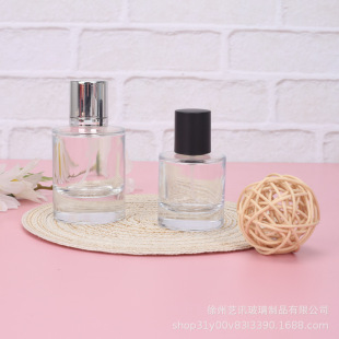 Cylindrical glass perfume bottle ladies perfume packaging bottle 50ml press spray bottle cosmetic packaging bottle wholesale
