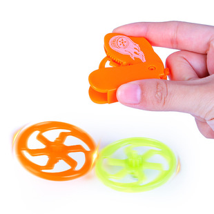 Mini rotating ground turning small top cross-border plastic launch small top desktop battle toy children's decompression toy