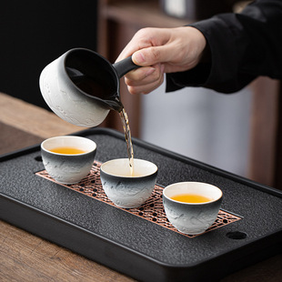 Annual meeting high-end kung fu automatic tea set suit lazy anti-scald Stone Mill tea maker household ceramic teapot tea cup