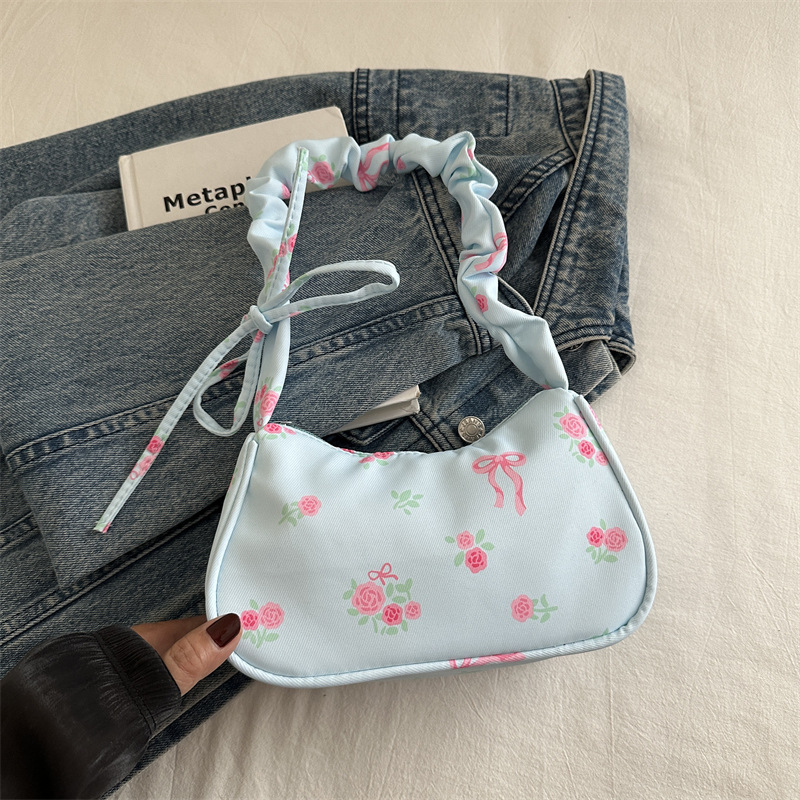 Gentle and sweet floral canvas bag for women, new 2024 style, drawstring shoulder bag, high-value floral bow underarm bag.