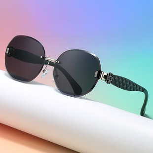 Egg-shaped oval rimless glasses wavy four-leaf clover leg sunglasses women's fashionable light luxury elegant sunglasses