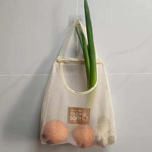 Home wall-mounted creamy-white storage hanging bag for ginger, garlic and onion hollow breathable storage bag wholesale