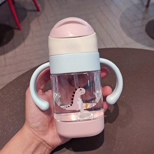 Children's cartoon suction cup bite gravity ball anti-choking baby drinking cup portable baby handle plastic water bottle