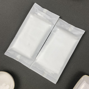 Disposable white bag wet towel in stock hotel catering entertainment logo OEM processing a generation of source factory