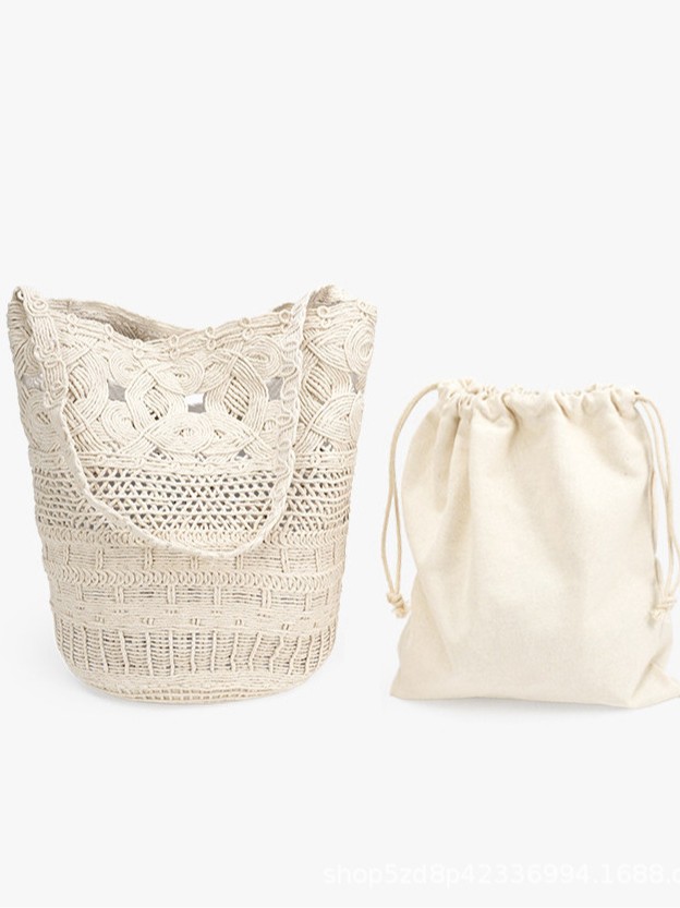 Pure white hollowed-out lace straw woven bag, new French style single shoulder woven bag, vacation beach versatile bucket bag, small.