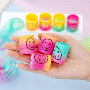 Mini smiley face rainbow ring cartoon spring ring puzzle folding ring kindergarten small gift science and education small toy wholesale