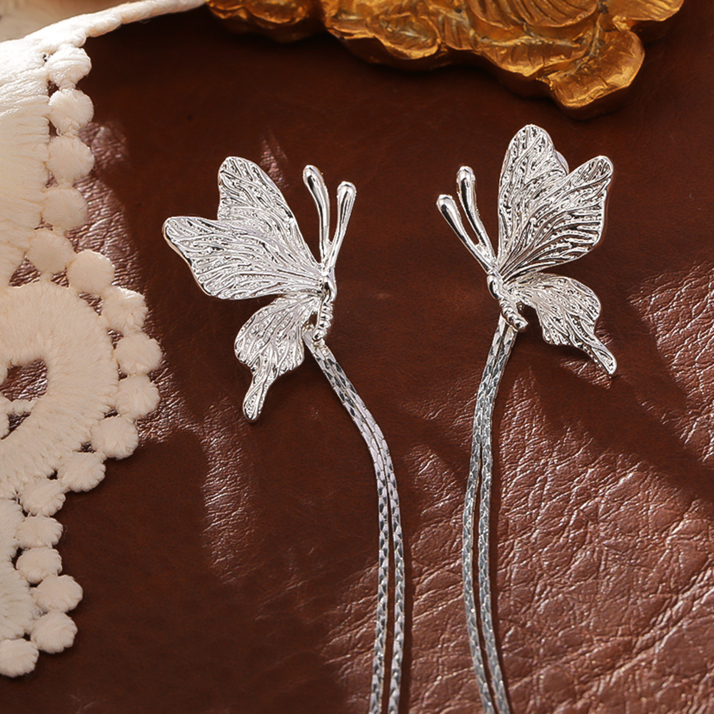 Super ethereal long tassel butterfly earrings, fashionable, sophisticated, elegant, and stylish accessories for a fairy-like girl.