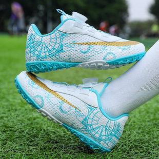 2023 new children's football shoes rotating button low-top men's and women's broken nail student sneaker youth training shoes