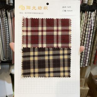 Autumn pleated skirt overskirt children's clothing plaid fabric polyester stretch bright silk gold and silver silk yarn-dyed plaid fabric wholesale