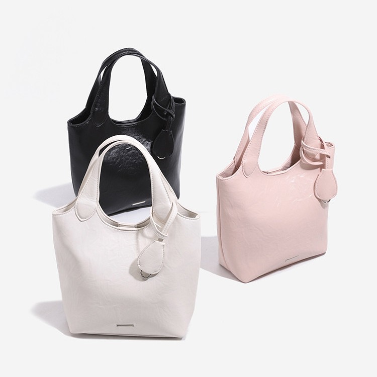 Soft leather handbag for women, 2026 new style, basket bag, everyday commuting, high-end crossbody bag, pink for summer.