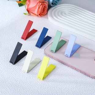 Desktop clip bracket neutral thin metal bracket multifunctional desktop flip charging treasure bracket manufacturers