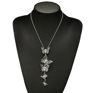 European and American cross-border jewelry retro fashion personality size hollow butterfly necklace alloy diamond pendant long neck chain