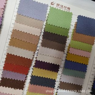 Spot supply of dragon and phoenix fabric polyester woolen autumn and winter coat Hanfu Cape fashion dyed fashion fabric