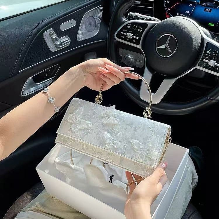 Niche design butterfly floral pattern white square handbag for women, 2025 new trendy handbag with chain strap.