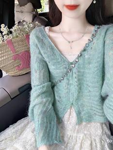 Early spring wear a set of hollow cardigan suspender top lace skirt gentle Han Feng chic dress