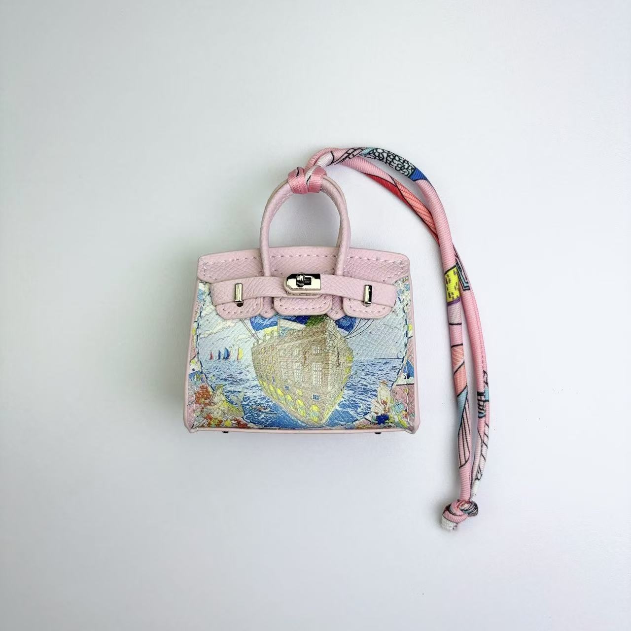 New high-end printed sailboat Birkin bag, creative printed Bluetooth earphone bag/car charm, versatile women's accessory.