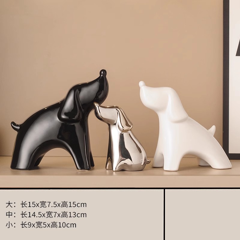 A family of three lucky dogs (black and white silver) 