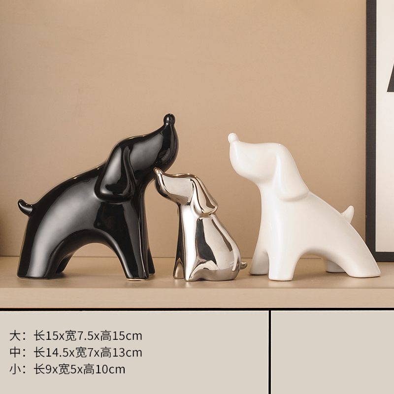 A family of three lucky dogs (black and white silver) 