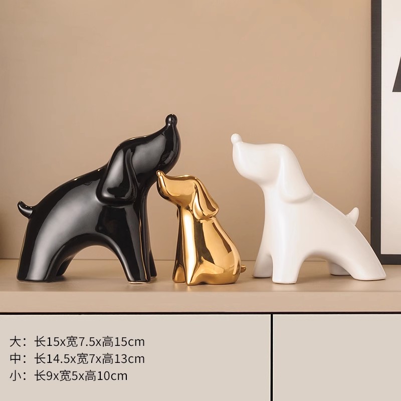 A family of three lucky dogs (black and white)