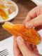 Kumquat-Kuchen, altmodische orangefarbene Kuchen, orangefarbene orangefarbene Kuchen, Kumquat-kandierte Früchte, getrocknete Kumquat-Früchte, nostalgische Snacks, in Wasser getränkt