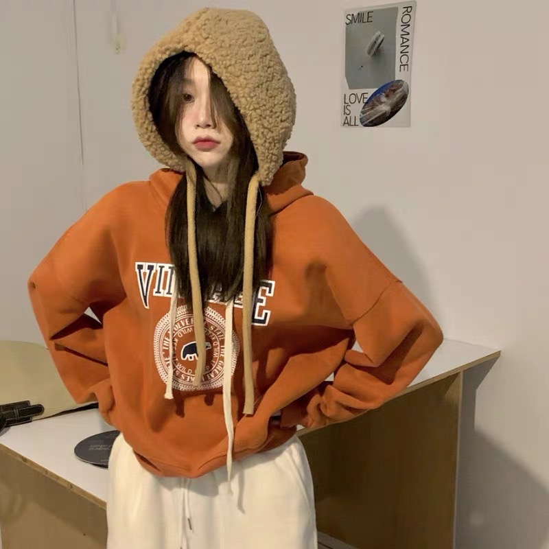 THE COUNTER SHOPPING MALL WITHDREW THE CUT LABEL AND THE SINGLE TAIL SINGLE WOMENS SWEATSHIRT IN AUTUMN AND WINTER AND THE VELVET THICKENED ATMOSPHERE PUMPKIN COLOR TOP
