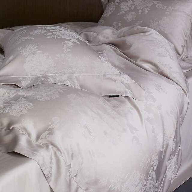 Direct sales of the manufacturer in spring and summer high-end cool feeling Tiansi cotton four-piece set light luxury style jacquard silky wide edge quilt cover bed sheet