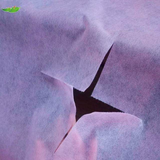Thickened disposable sheets and rolls beauty salon with cross holes and holes, non-woven breathable physiotherapy massage bed