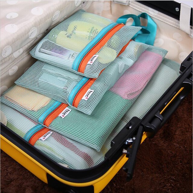 Online bag four-piece set of cosmetics storage and sorting bags for men and women travel suitcase storage and free shipping