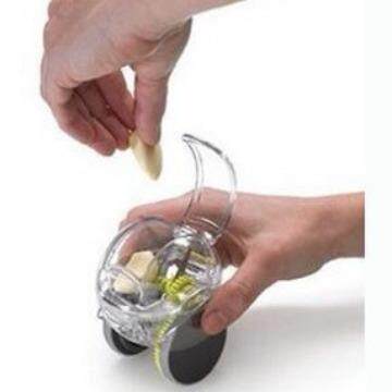 Kitchen creative tool roller-type garlic cutter manual garlic crusher Quick garlic clay grinder Garlic grinder