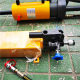 Hydraulic coupler removal tool without any effort to pull the horse and remove manual pump hydraulic puller spot