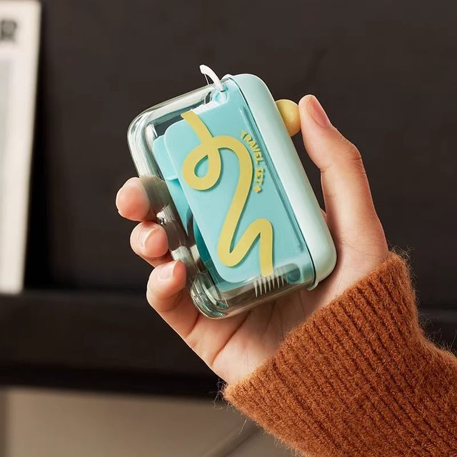 Fun dopamine portable floss box automatic outgoing lightweight and portable two colors optional household floss storage box