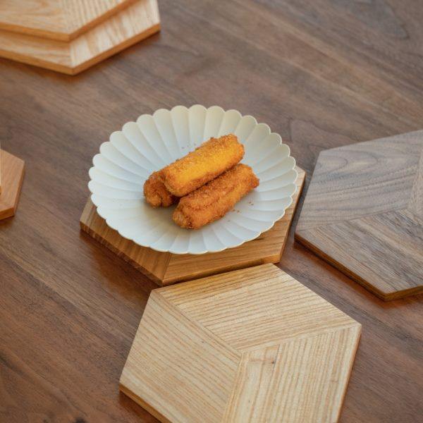 Black walnut solid wood thermal insulation coatings, anti-scalding water cups, tea cups, pot holders, pots, meal plates, pot cushion pads