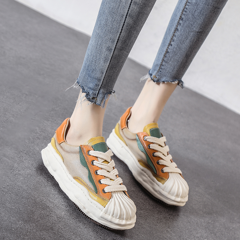 SOFT LEATHER SURFACE MULTI-COLOR TONES CANT PUT IT DOWN GJIN LEADS THE TRENDY PERSONALITY AND IS VERSATILE JUST LIKE IT