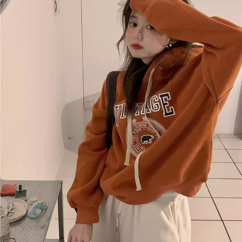 THE COUNTER SHOPPING MALL WITHDREW THE CUT LABEL AND THE SINGLE TAIL SINGLE WOMENS SWEATSHIRT IN AUTUMN AND WINTER AND THE VELVET THICKENED ATMOSPHERE PUMPKIN COLOR TOP