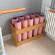 Yoga mat storage rack wooden cabinet basket barrel basket fitness carpet rack Pilates storage tool storage rack household use