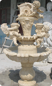 进口埃及米黄石雕小天使喷泉