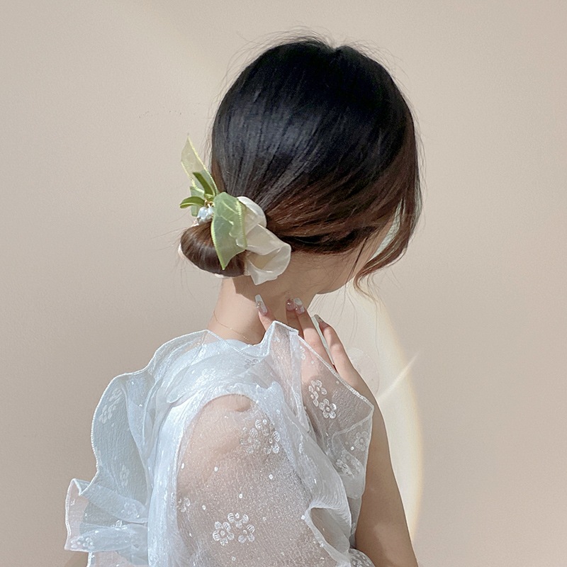 绿色蝴蝶结茶花肠圈